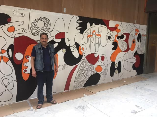 الفنان التشكيلي مصطفى الزوفري يبصم على عمل فني رائع بمحطة الشمال ببروكسيل .